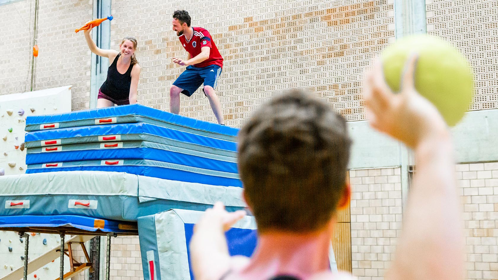 Students playing modern catch
